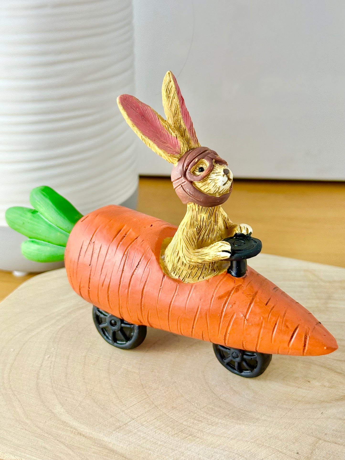 Jasper Rabbit sitting in a carrot car