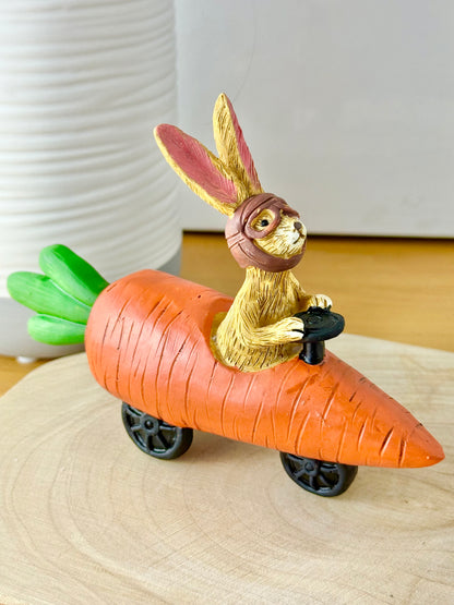 Jasper Rabbit sitting in a carrot car
