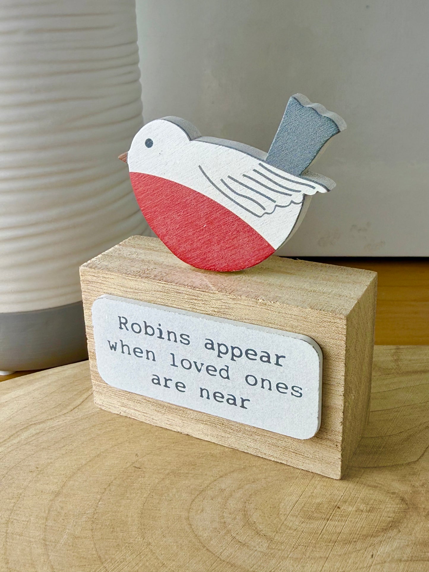 Robins appear wooden block sign