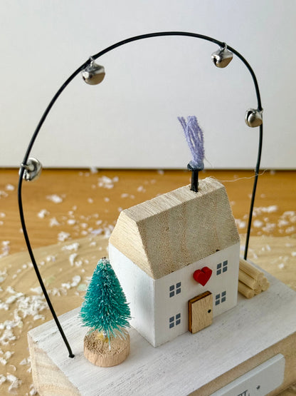 Wooden Noel House with bell arch