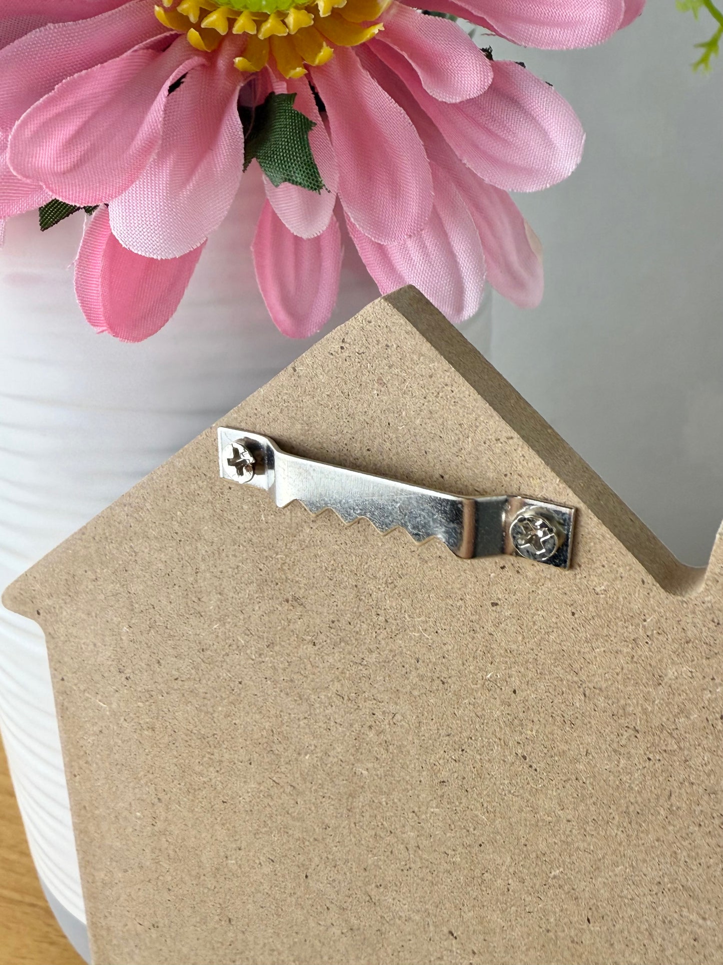 It's the Cats House we just pay the mortgage wooden sign