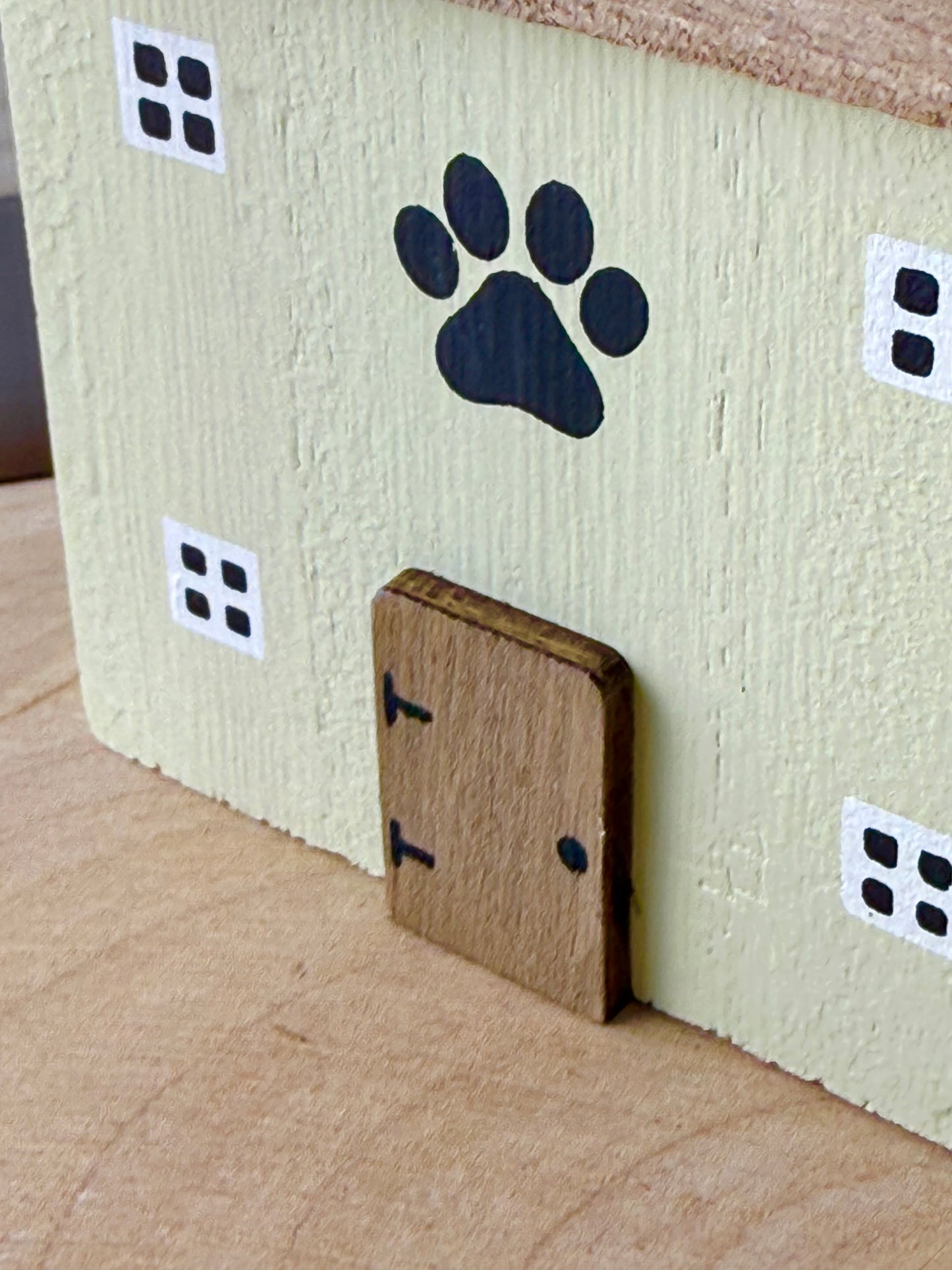 Muddy Paws Green wooden house
