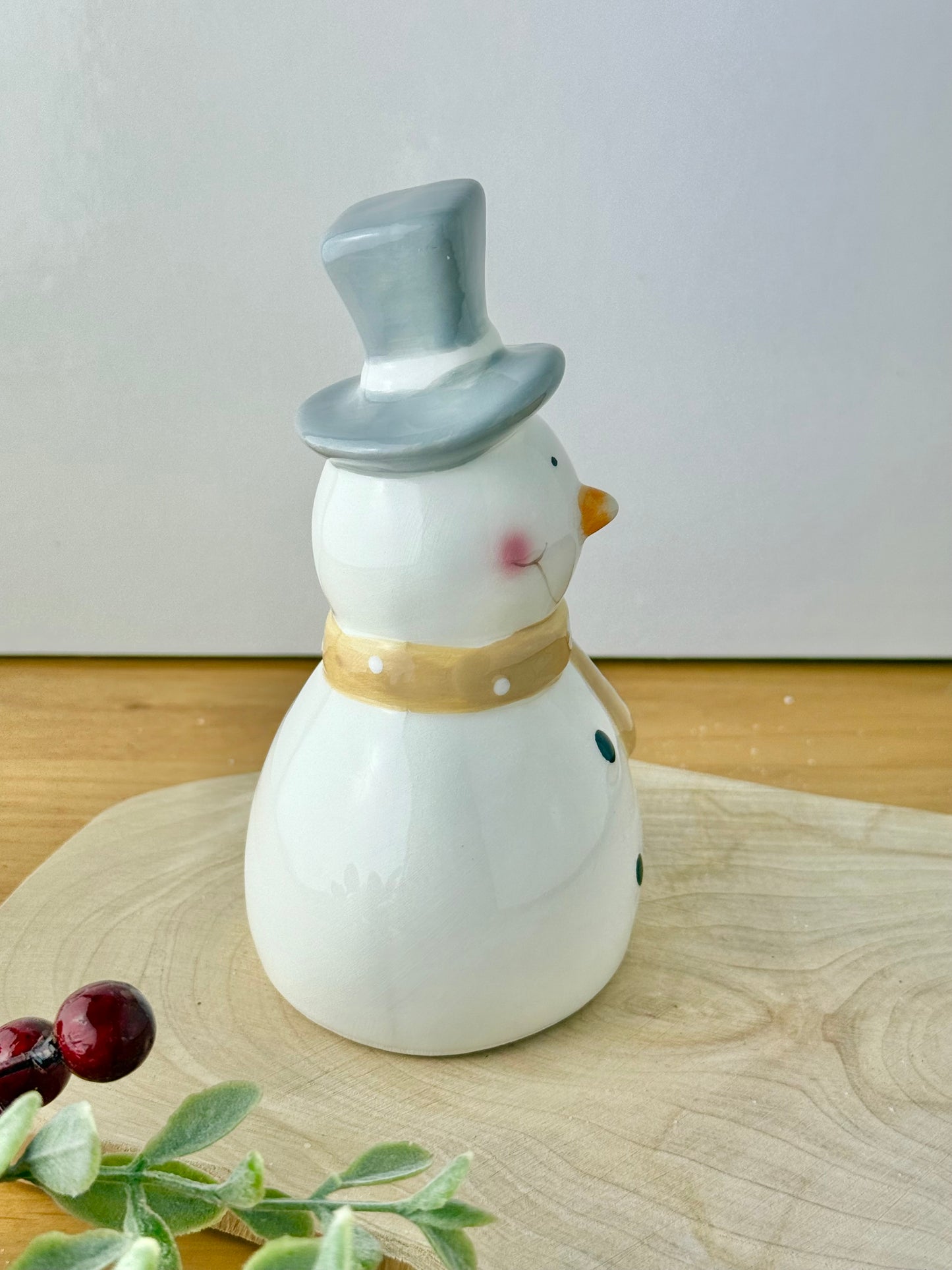 Snowman Wearing a Grey Top Hat