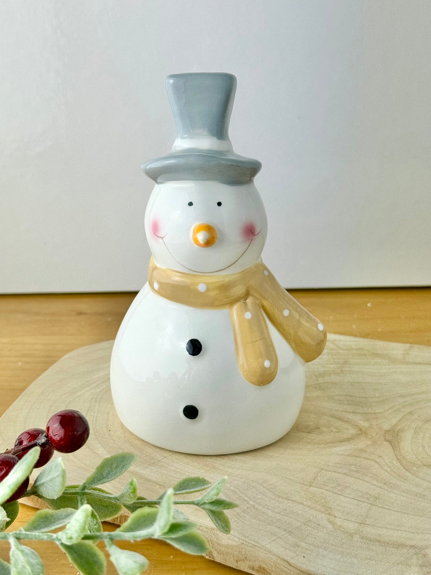 Snowman Wearing a Grey Top Hat