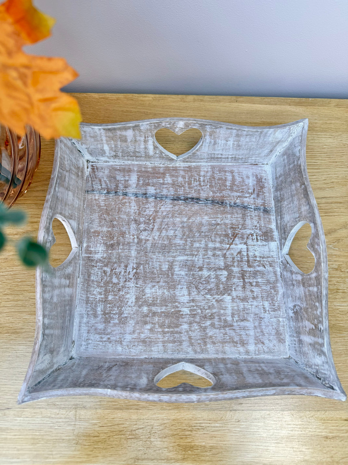 Wooden square tray with heart cutouts