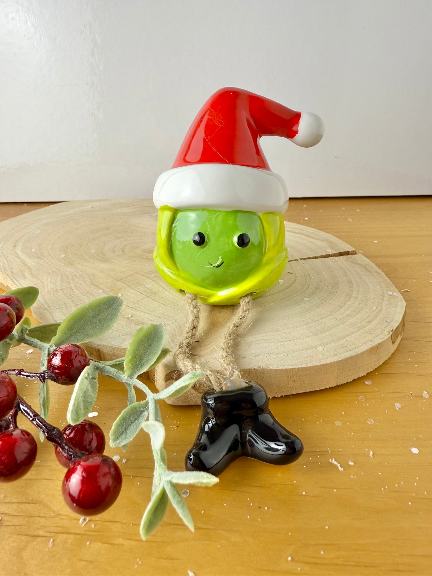 Green Sprout Shelf Sitter with dangley legs