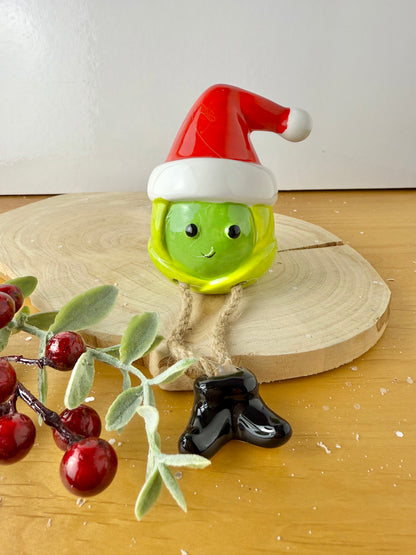 Green Sprout Shelf Sitter with dangley legs