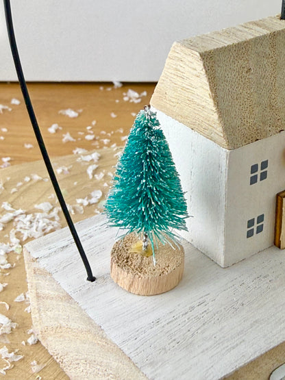 Wooden Noel House with bell arch