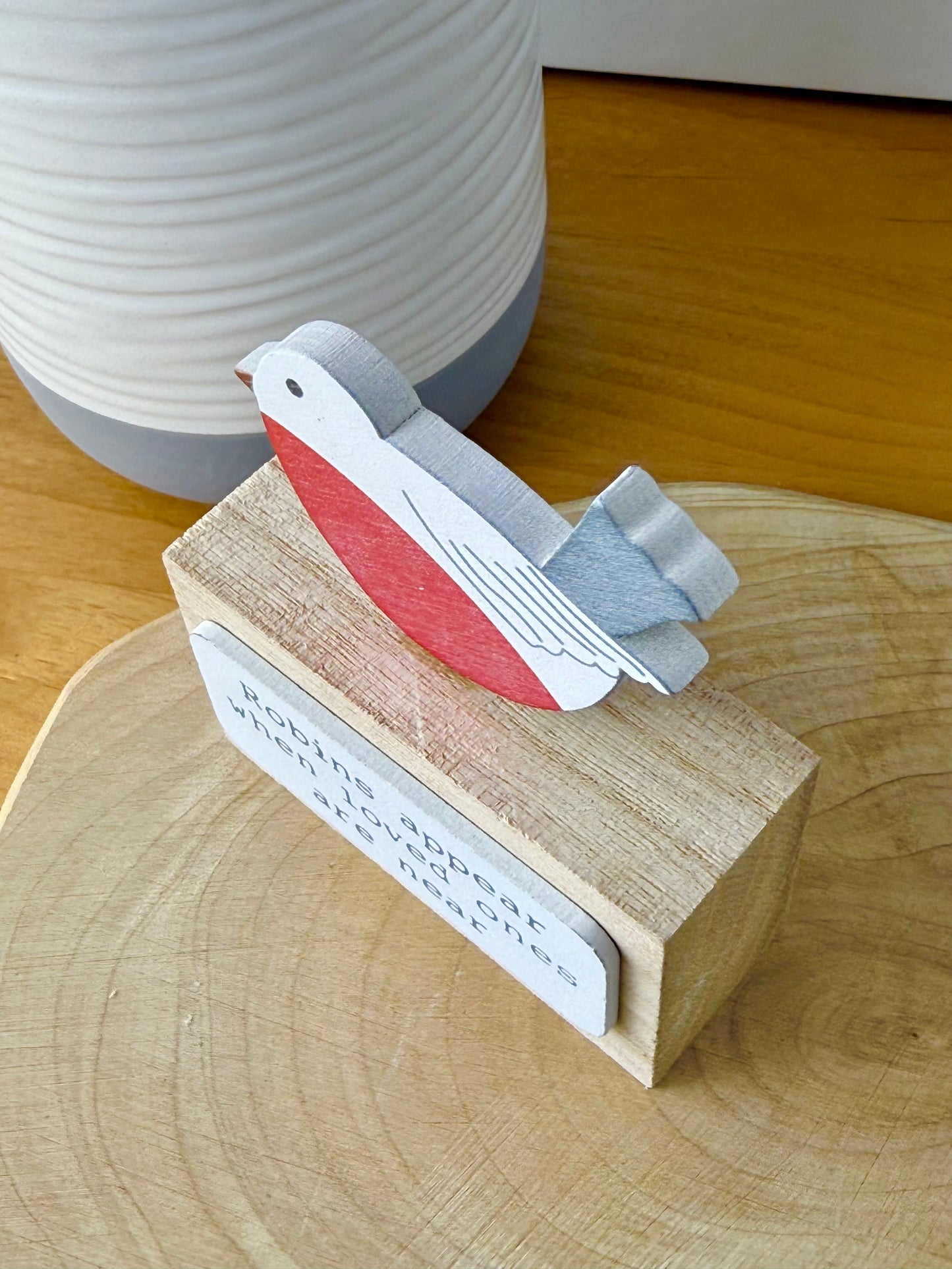 Robins appear wooden block sign