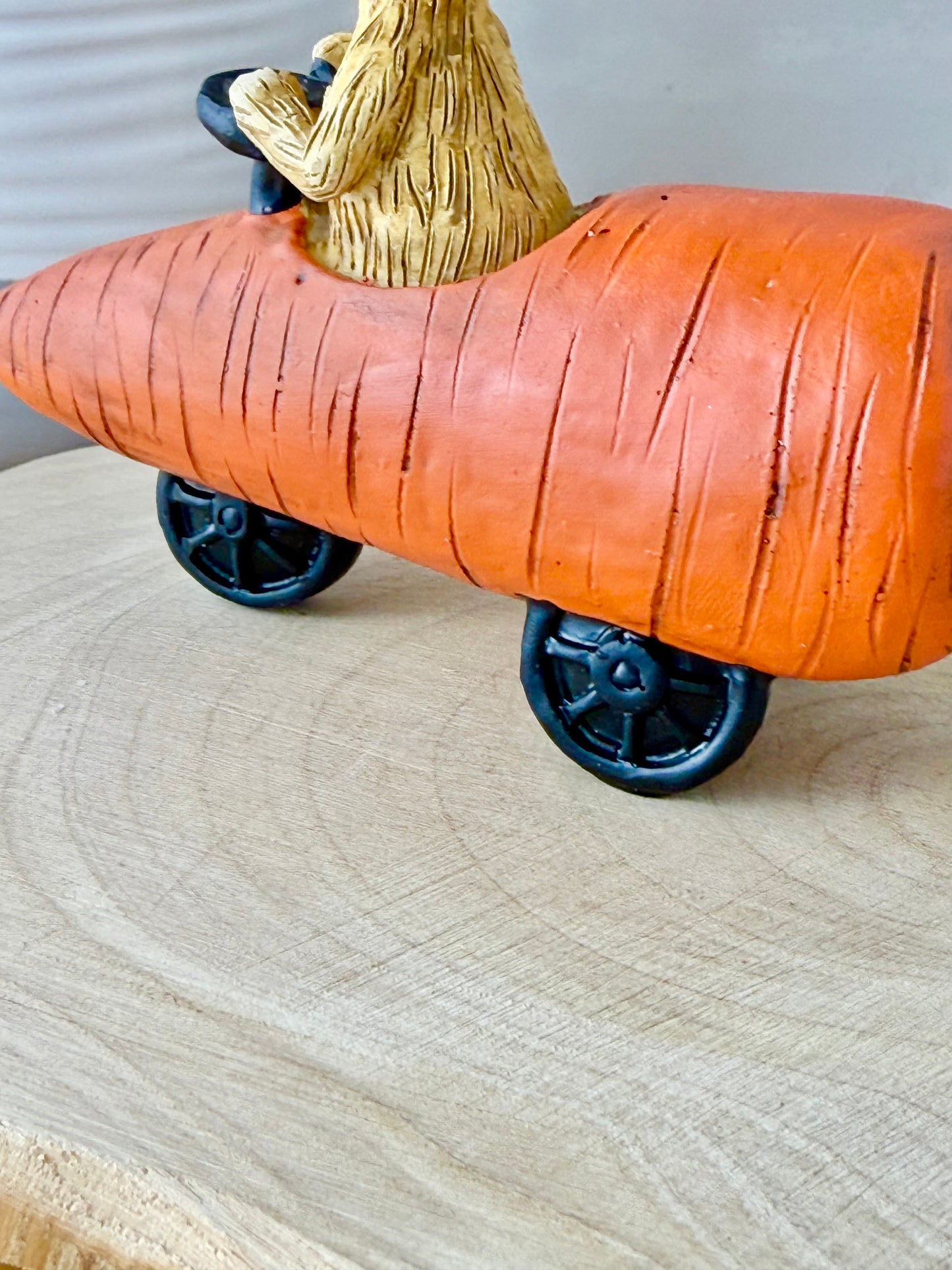 Jasper Rabbit sitting in a carrot car