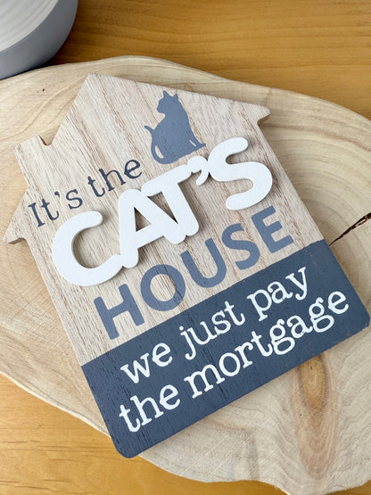 It's the Cats House we just pay the mortgage wooden sign