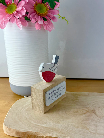 Robins appear wooden block sign