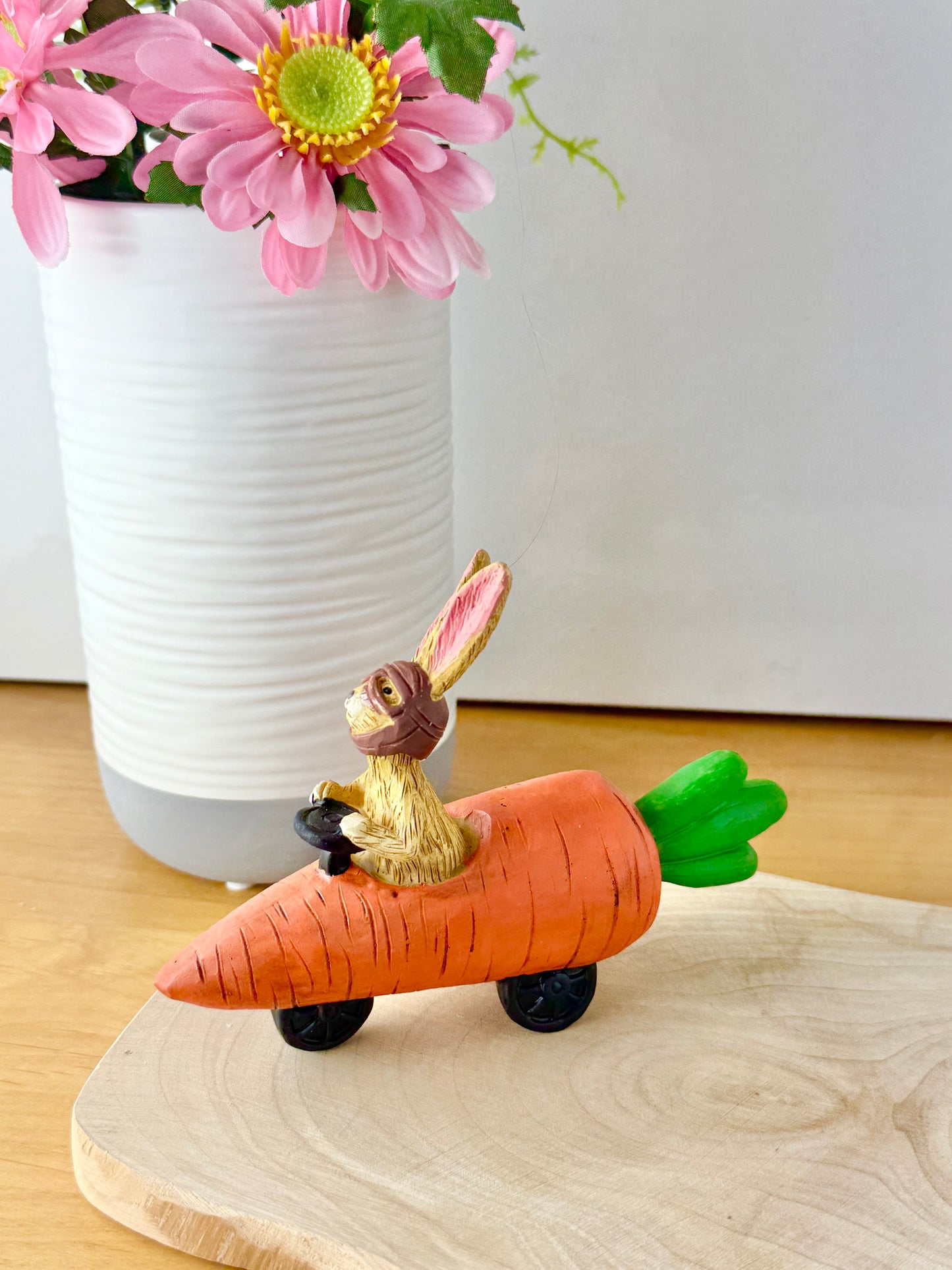 Jasper Rabbit sitting in a carrot car