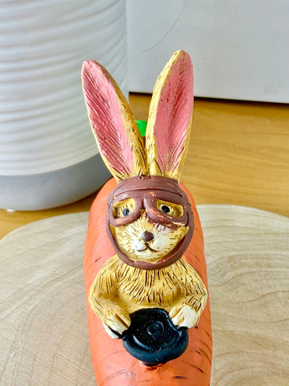 Jasper Rabbit sitting in a carrot car