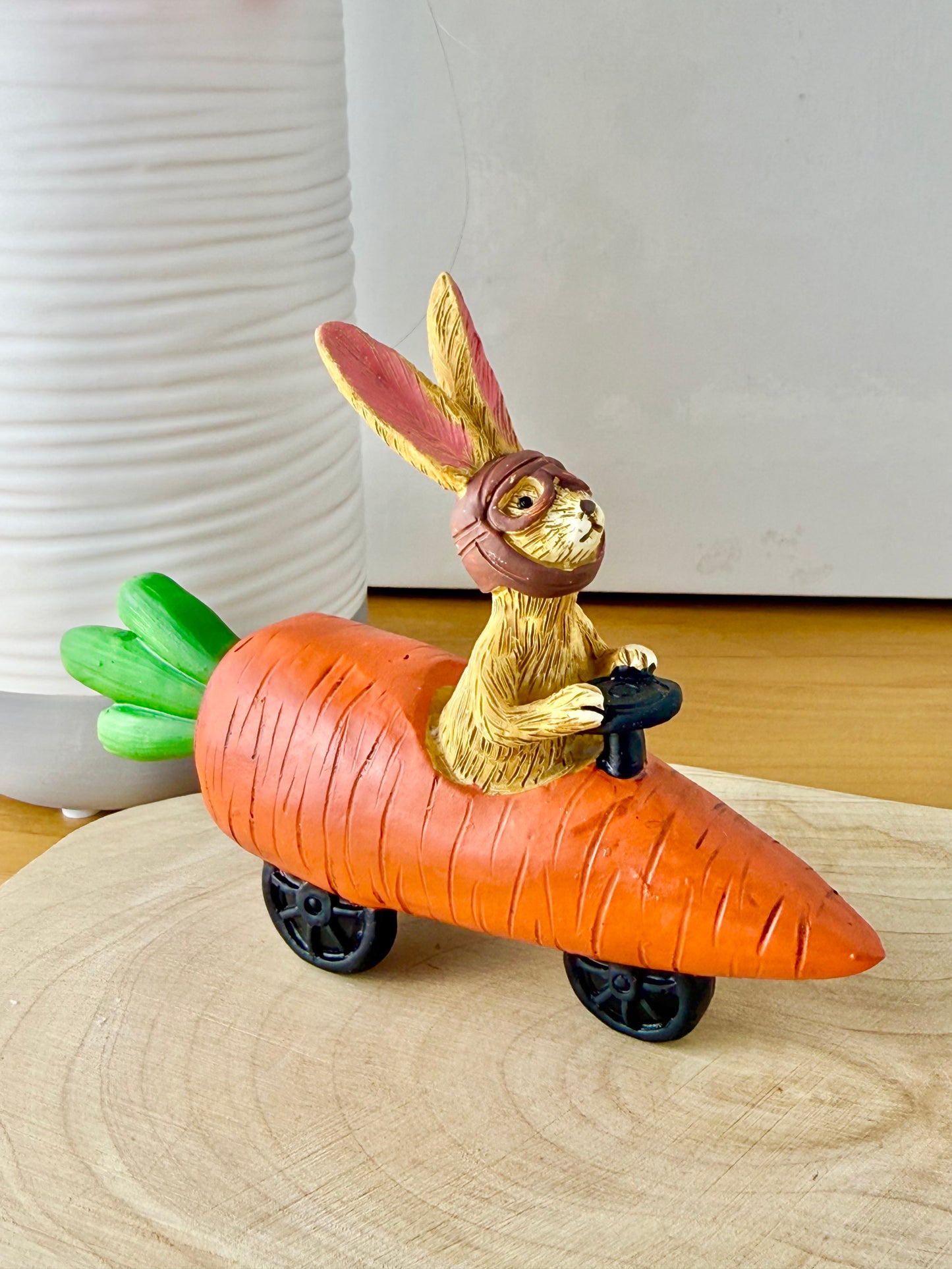 Jasper Rabbit sitting in a carrot car