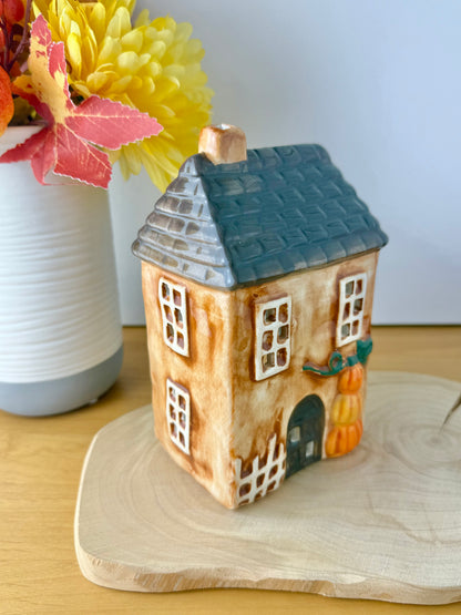 Autumn house with Pumpkins