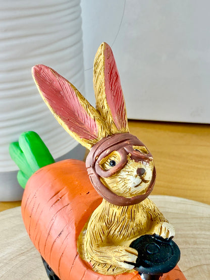 Jasper Rabbit sitting in a carrot car