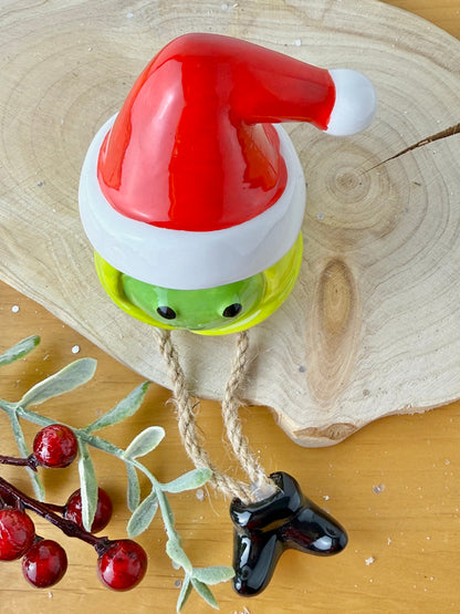Green Sprout Shelf Sitter with dangley legs