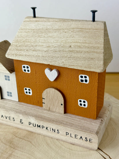Autumn leaves & pumpkin wooden houses