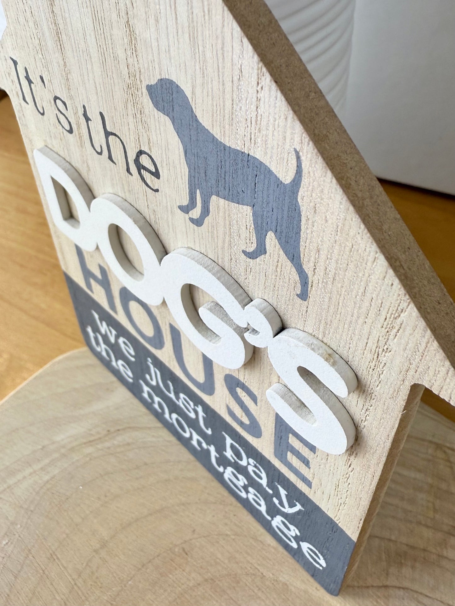 It's the Dogs House we just pay the mortgage wooden sign
